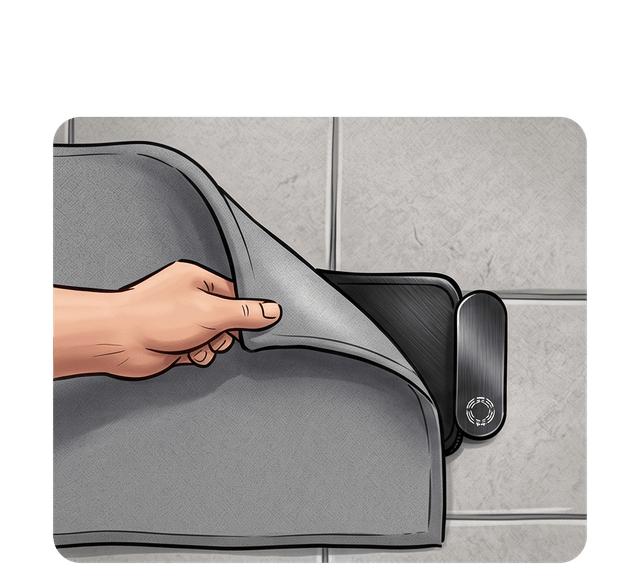 A hand lifts the corner of a doormat, revealing the slim chime sensor tucked underneath.